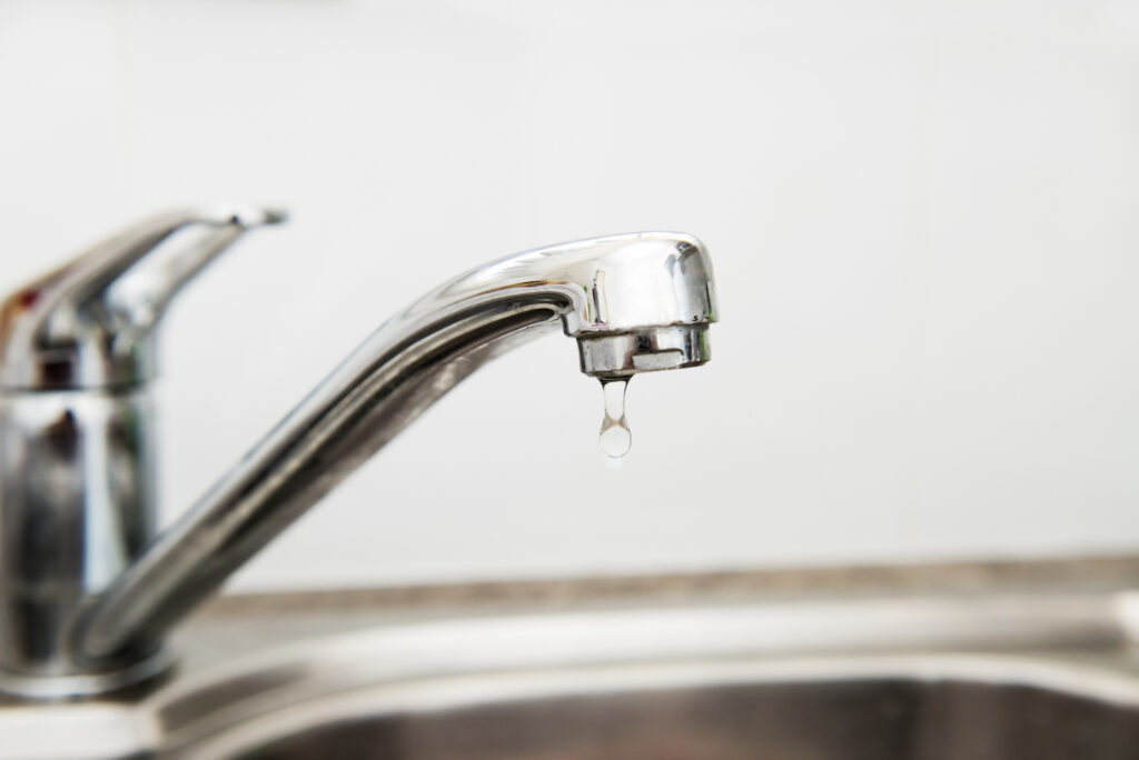 Faucet with drip of water